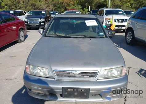 2001 Infiniti G20 Luxury from USA, damaged, VIN JNKCP11A31T406410